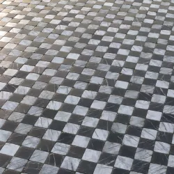 Aged marble black and white chequered tiles Texture