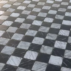 Aged marble black and white large chequered tiles Texture