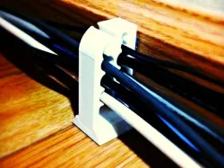 Baseboard Mountable Cable Organizer