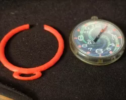 Swatch pocket watch, holding ring