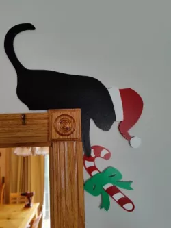 Door Frame Christmas Cat