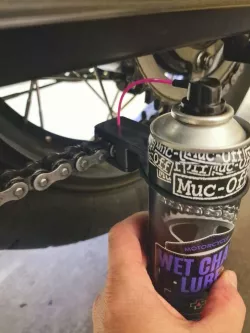 Tool for lubricating motorcycle chain