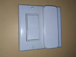 Magnetic flat light switch cover