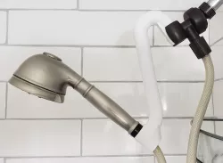 Shower head position and angle adjuster