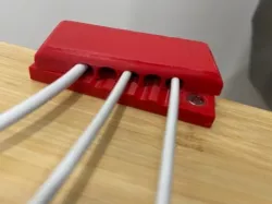 Magnetic cable organizer for desk with clamps
