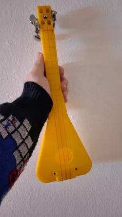Piccolo size Triotune -  Playable 3 string mini ukulele-style instrument 