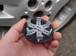 Center cap clips tabs solution for Land Rover wheels on a Saab 9-3