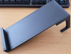 Steering wheel phone holder
