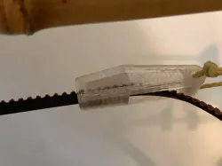 Ziptie-like belt lock