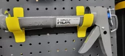 Caulk Gun Pegboard Mount