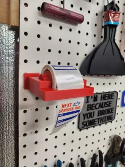 Oil reminder dispenser pegboard