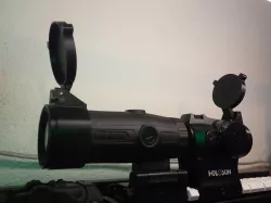 Parameterized spring-loaded scope cap