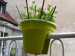 Flower pot holder for balcony railings