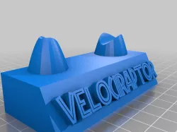 Velociraptor claw stand with label