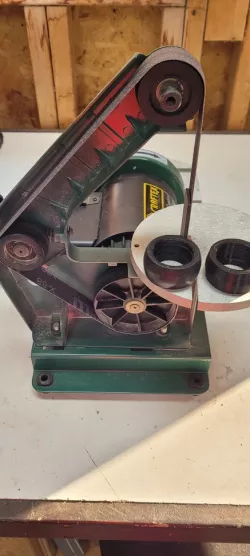 Idler roller belt sander