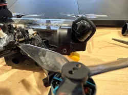 Lumenier AXII mount for Tiny Trainer v2 modified. Original file found in onshape public files under user theWesley