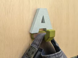 Letter coat hangers