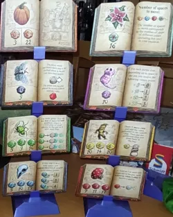 Quacks of Quedlinberg Spell recipes and witches actions stand