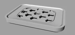 Soapdish with removable water collector grid.