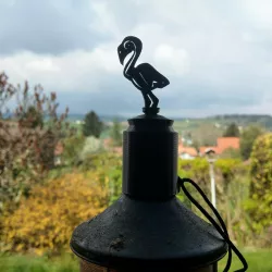 Torch stopper (flamingo figurine)