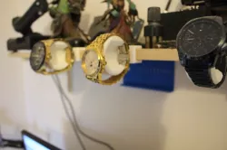 display stand watch on shelf