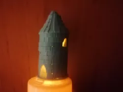 Old ruined tower electric candle cover