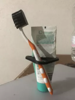 toothpaste squeezer - toothbrush holder