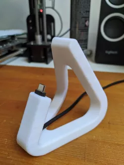 Curved phone stand with cable