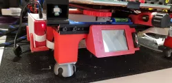 printer stand with squash ball