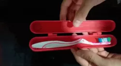 TOOTHBRUSH HOLDER
