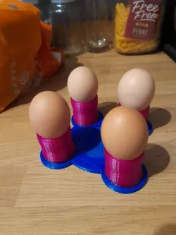 Egg cup holder with plate.