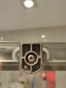 Shower glass fixing element, shower glass rail, shower rail holder