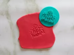 Stamp with handle "Merry Christmas".