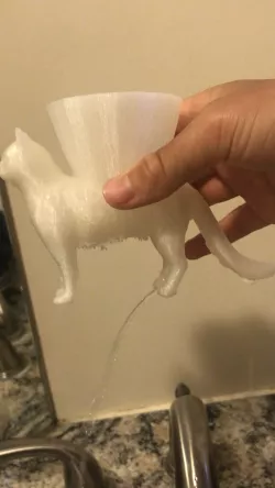 Cat Pot With Water Drainage in a funny Spot