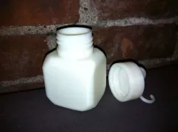 screw top cubic bottle with loop and hook