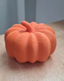 Three decorative pumpkins