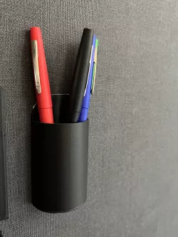 Wall mounted pen holder