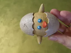 Baby Chicken in cracked Easter Egg