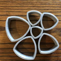 Curved triangle cutter set