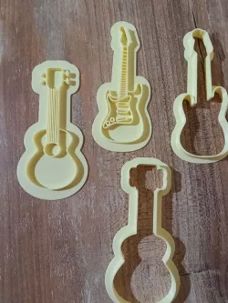 Electric and Creole guitar and marker cutter