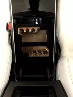 Ergonomic coin-holder for Tesla Model 3