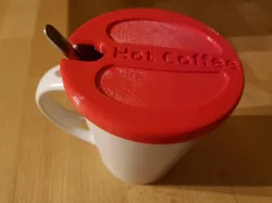 HotCoffee Mug Cap to keep your drink warm.