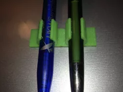 Stick-on pen holder