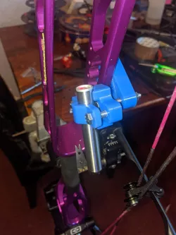 compound string and cam aligner