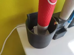 electric toothbrush holder + toothpaste