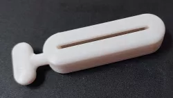 Toothpaste tube press glue