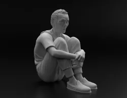 Squid Game player 001 Oh Il-Nam sitting sad