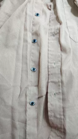 Eye-shaped button