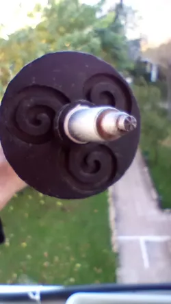 ski pole rosette with triskel figure