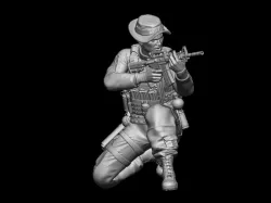 AMERICAN SOLDIER CROUCHING WITH RIFLE